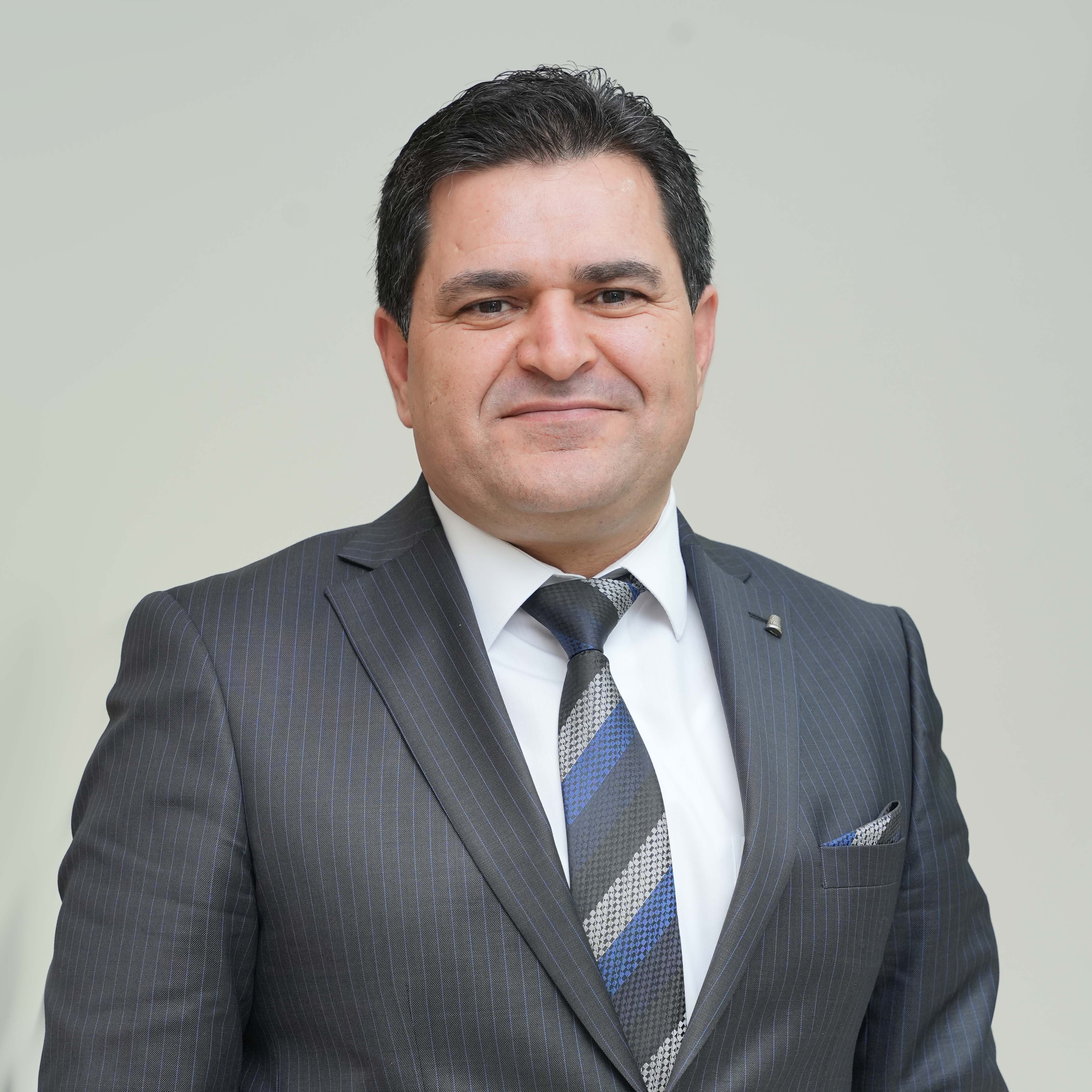 الأستاذ الدكتور محمد حكم الشياب